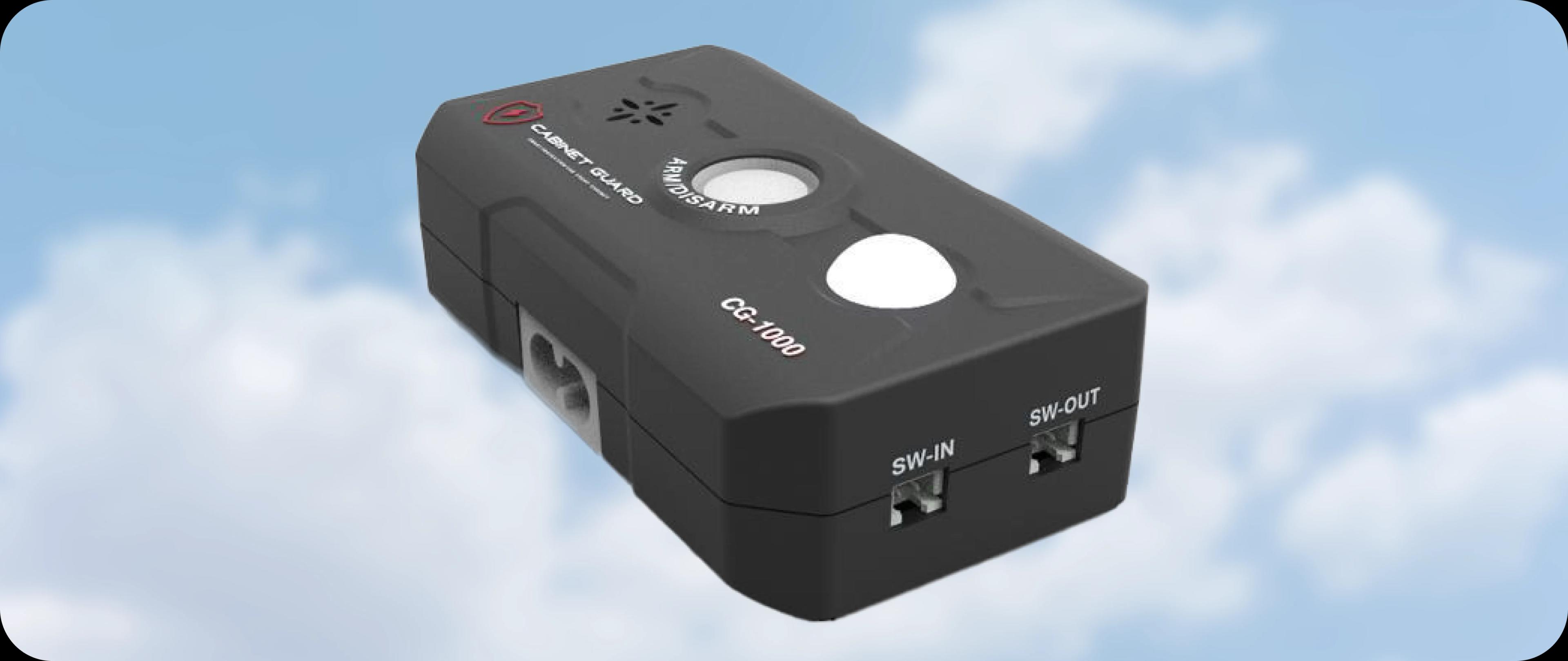 Cabinet Guard CG-1000 tamper alarm showing siren, strobe, and sensor in a close-up view