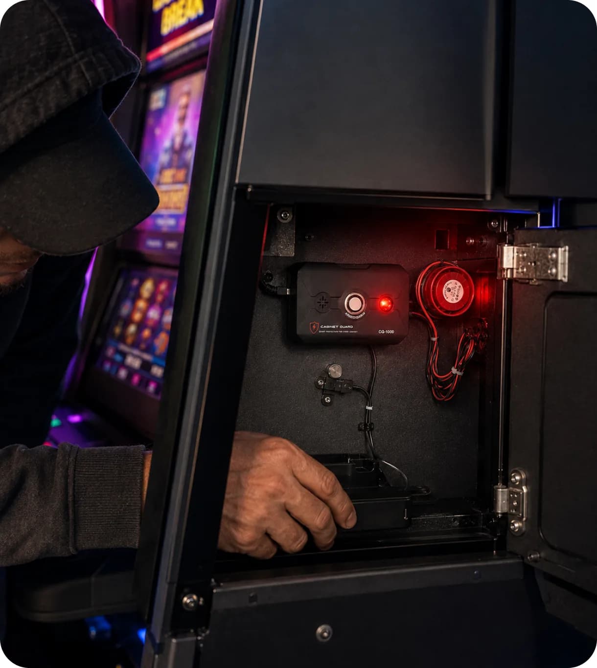 Technician working near a Cabinet Guard unit mounted inside a cabinet