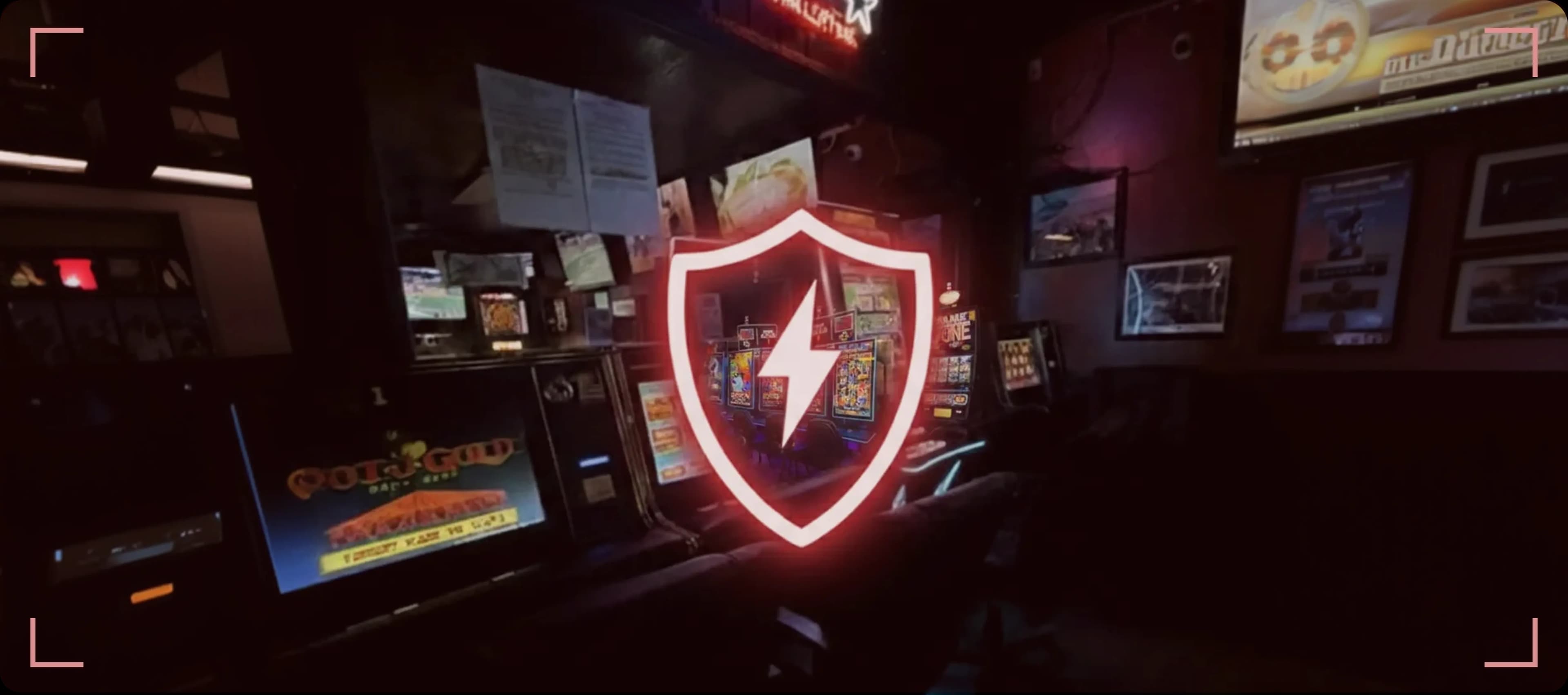 Cabinet Guard logo overlay on VGT gaming machines showing cabinet security protection